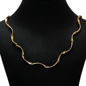 Scharff Halskæde af 14 kt. guld. L. ca. 60 cm. Vægt ca. 43 gr. Ca. 1980.
