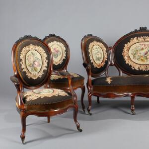 Nyrococo salon af mahogni bestående af medaljon sofa, armstol og et par stole samt ikke tilhørende armstol og et par krinolinestole. Ca. 1860. 7