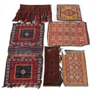 Seks nomade tekstiler. To torbas 84 x 62, 30 x 80. Khasgai forligger. 50 x 50., belouch dobbelttaske. 162 x 76, samt to kurdiske opbevaringssække. 50 x 50.6