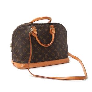 Louis Vuitton Alma håndtaske af monogram canvas med to hanke og skulderrem af kernelæder. L. ca. 23 x 32 x 17 cm.