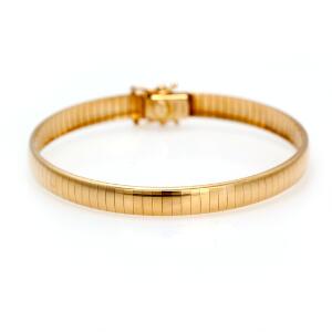 Aurafin armbånd af 14 kt. guld. L. ca. 18 cm. Vægt ca. 15 gr. Æske medfølger.