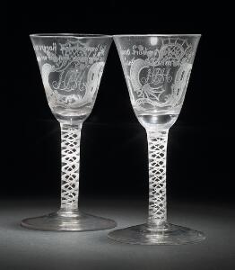 To Hurdal vinglas med benhvide spiraler og kartouche med tekst. Norge, 18. årh. H. 17 cm. 2