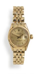 Rolex Damearmbåndsur af 18 kt. guld. Model Oysterperpetual DateJust, ref. 6521. Chronometer certificeret automatisk værk med dato. 1960-70.