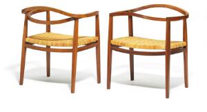 Ole Gjerløv Knudsen Et par sjældne armstole af palisander med originalt sæde af flet, løse tilhørende hynder i sæde og ryg betrukket med sort skind. 2