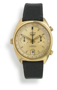 Heuer Herrearmbåndsur af 18 kt. guld. Model Carrera, ref. 1158 Gold brick. Automatisk kronografværk med dato. Ca. 1971-72.
