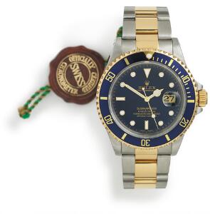 Rolex Herrearmbåndsur af guld og stål. Model Submariner, ref. 16613. Chronometer certificeret automatisk værk med dato. 2000.