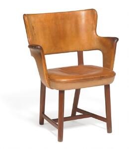 Tyge Hvass Unik armstol af Cubamahogni. Sæde og ryg med integrerede armlæn betrukket med patineret naturskind.