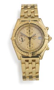 Breitling Herrearmbåndsur af 18 kt. guld. Model Chronomat. Chronometer certificeret automatisk værk med kronograf og dato. 1990-2000erne.