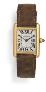 Cartier Damearmbåndsur af 18 kt. guld. Model Louis Tank. Quartz. 1980erne.