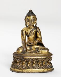 Nepalesisk buddha af forgyldt bronze. 16. årh. H. 9,5 cm.