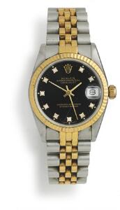 Rolex Damearmbåndsur af guld og stål. Model DateJust, ref. 68273. Chronometer certificeret automatisk værk med dato. 1986.