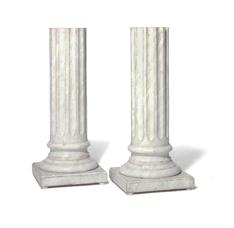 A pair of Swedish marble painted round fluted columns on profiled and...