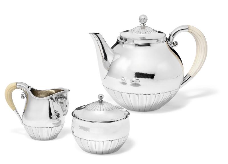 Johan Rohde: Sterling silver tea set with slightly hammered surface and...