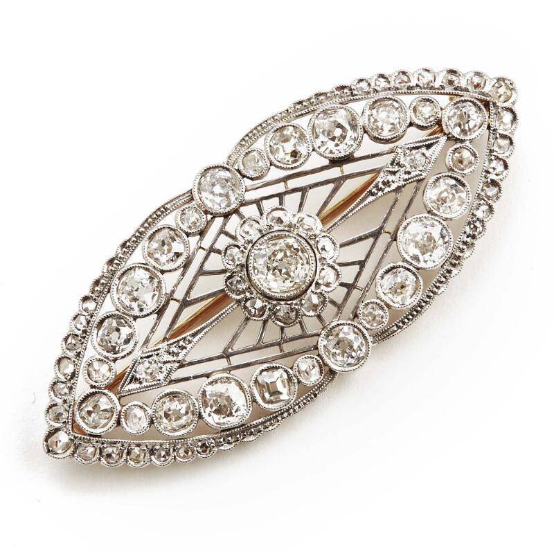 A Belle Èpoque diamond brooch set with numerous old and table-cut diamonds...