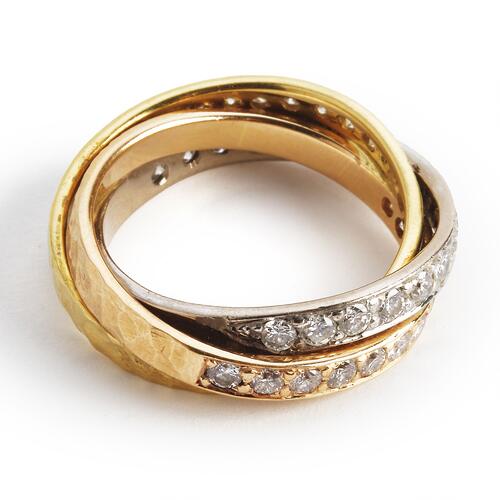 Klarlund: A diamond ring set with numerous brilliant-cut diamonds ...