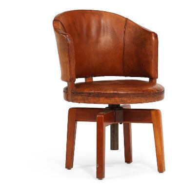 Swivel chair with mahogany frame. Seat and back upholstered with patinated original Niger leather. Made approx. 1940s.