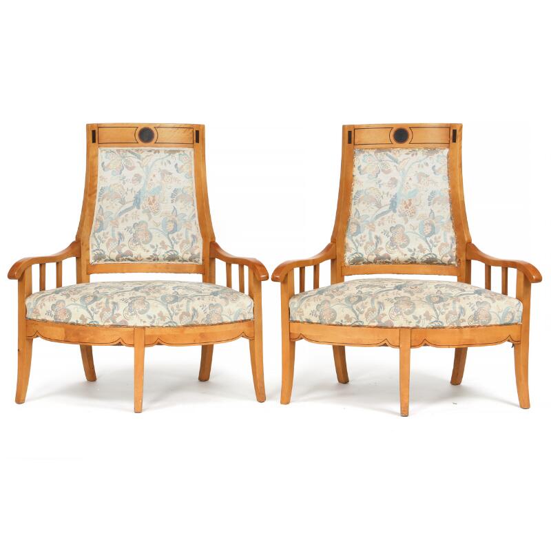A pair of large Swedish Grace birchwood armchairs. Early 20th century. (2).