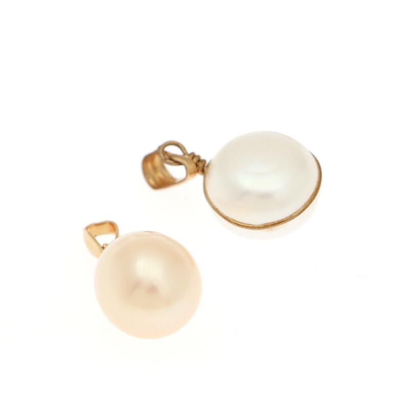 A jewellery collection comprising a pair of pearl earstuds, two pearl...