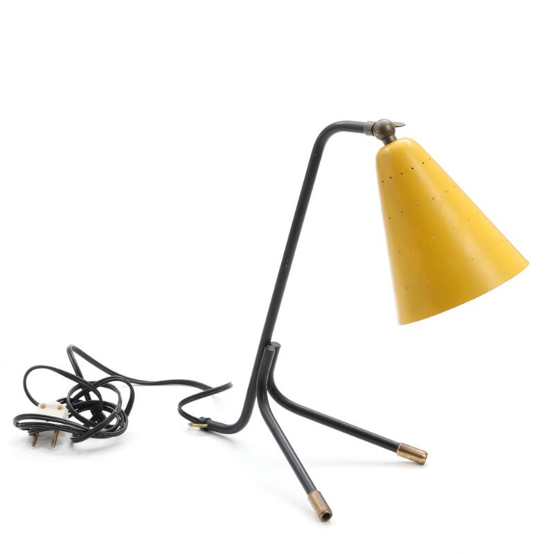 Designer unknown: A black lacquered metal and brass table/wall lamp on...