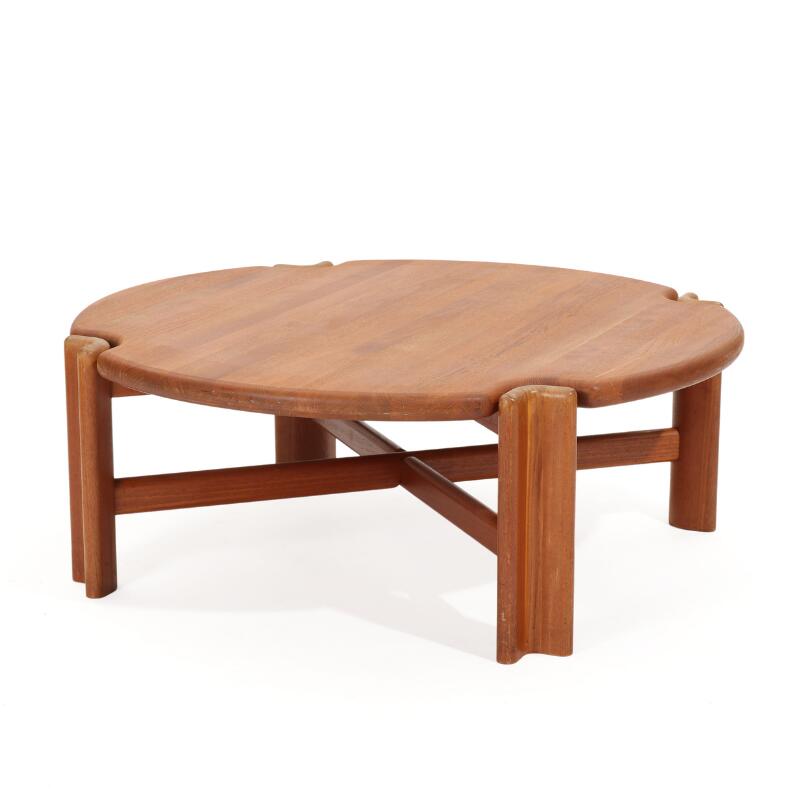 Danish furniture design: A circular solid teak coffee table. Presumably ...