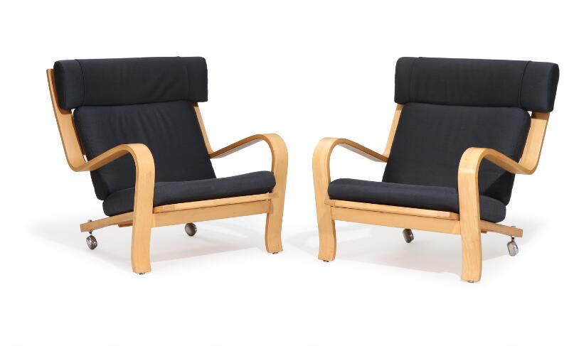 Hans J. Wegner: “GE 550A”. A pair of laminated highback beech easy chairs...
