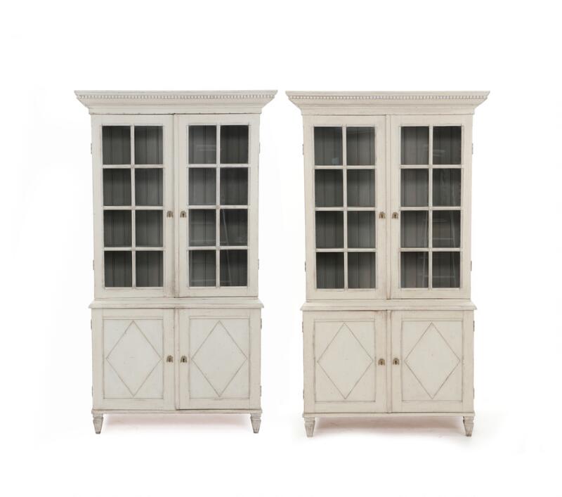 A pair of Gustavian style display cabinets. Sweden, late 19th century and...
