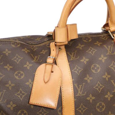 Louis Vuitton: A Keepall 50 travel bag of brown monogram canvas with  brown leather trimmings and gold tone hardware. – Bruun Rasmussen  Auctioneers