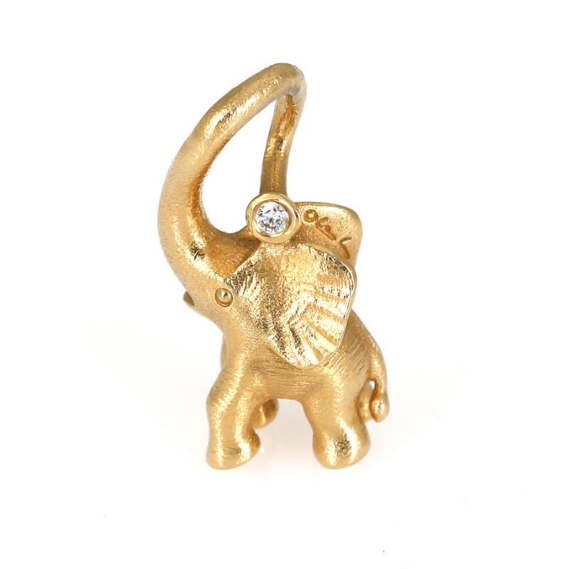 A diamond pendant in the shape of an elephant set with a brilliant-cut...