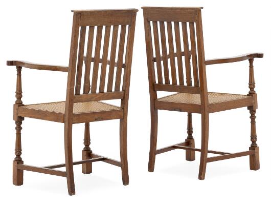 Arts and Crafts: A pair of chairs with patinated oak frames. Seat