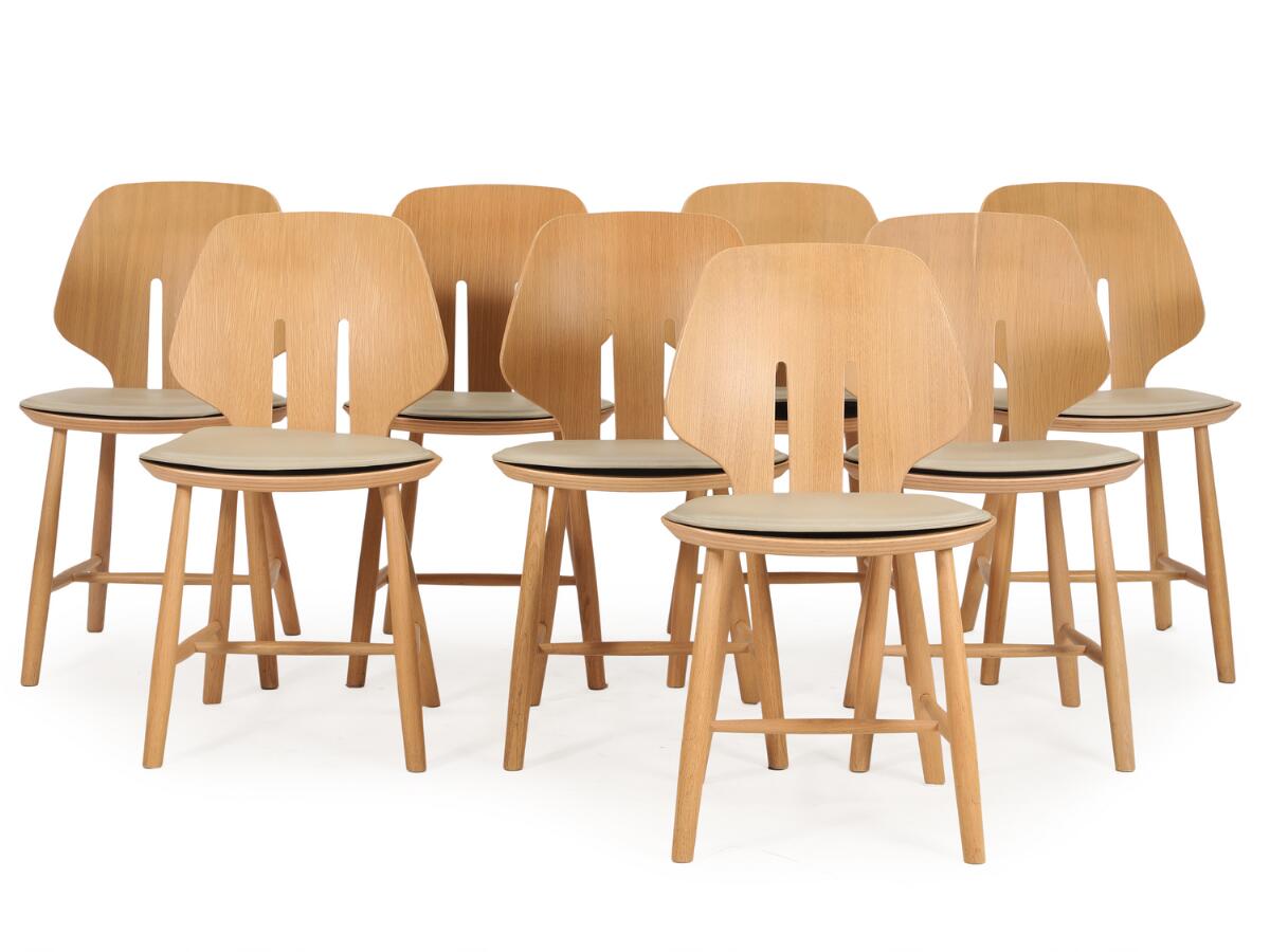Ejvind A. Johansson: Set of eight oak chairs. Model J 67. Designed 1957. Manufactured and marked by FDB Møbler. (8)