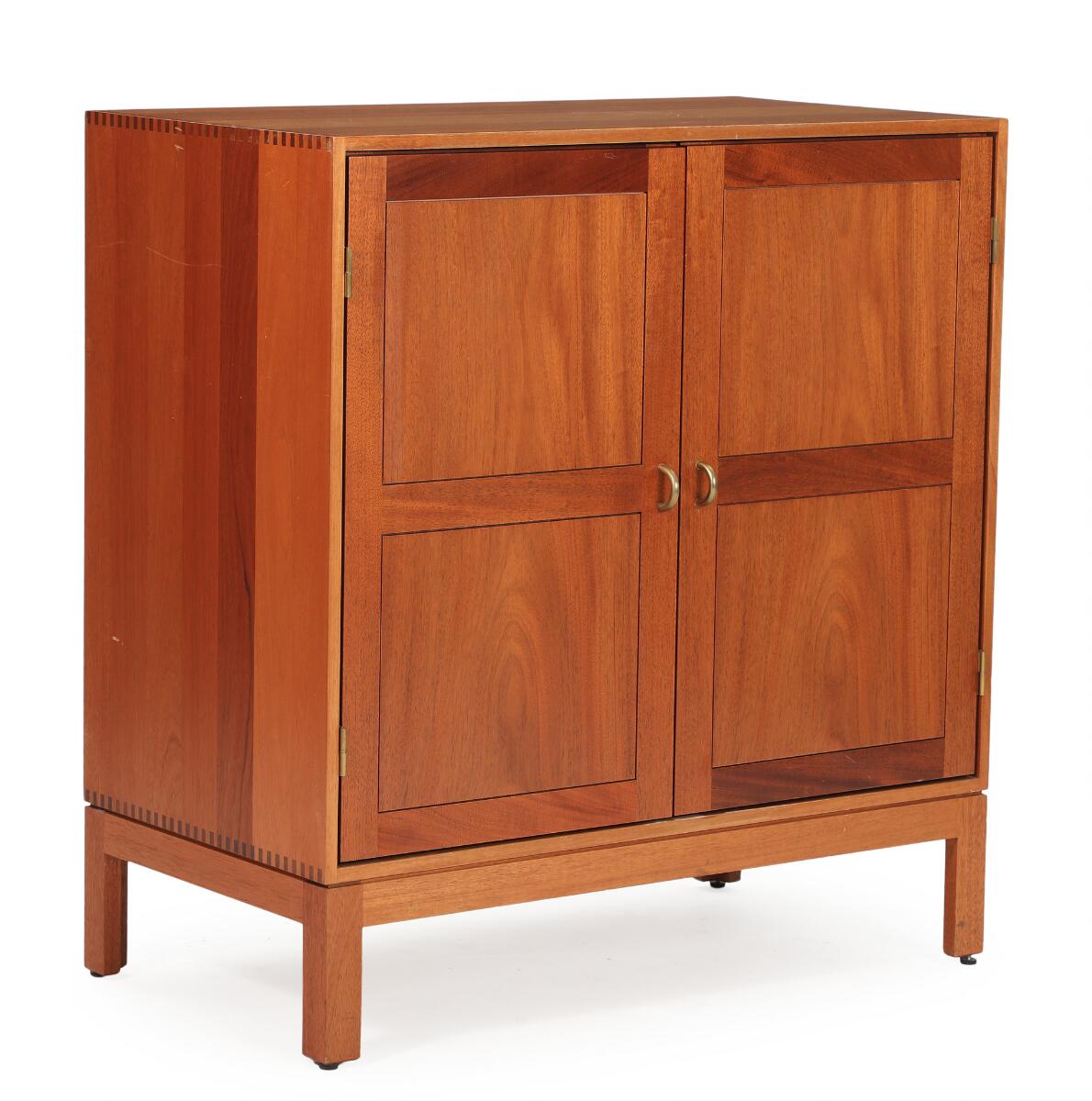 Christian Hvidt: Solid mahogany cabinet with brass handles. H. 95. W. 90. D. 49 cm.