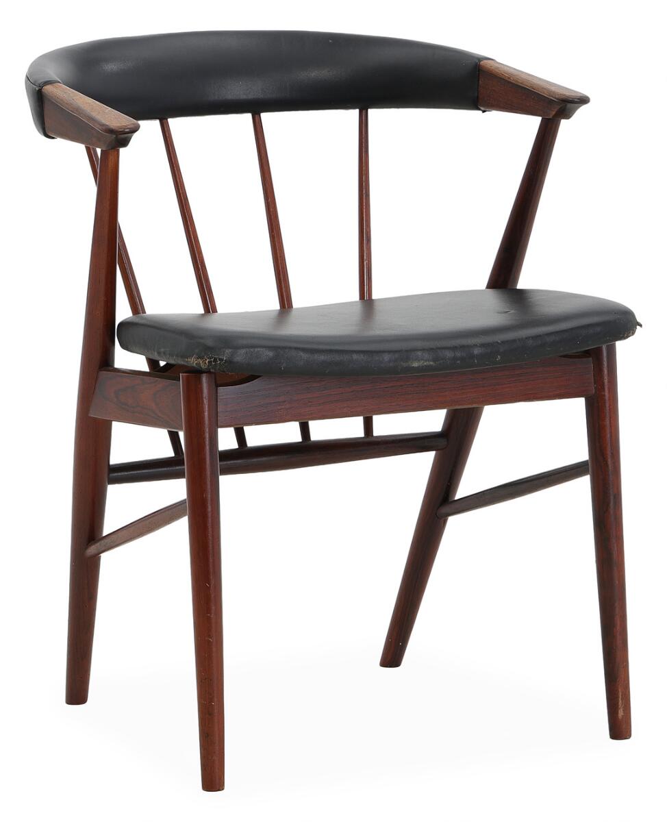 Helge Sibast: A rosewood armchair, upholstered in seat and back with blacl leather.