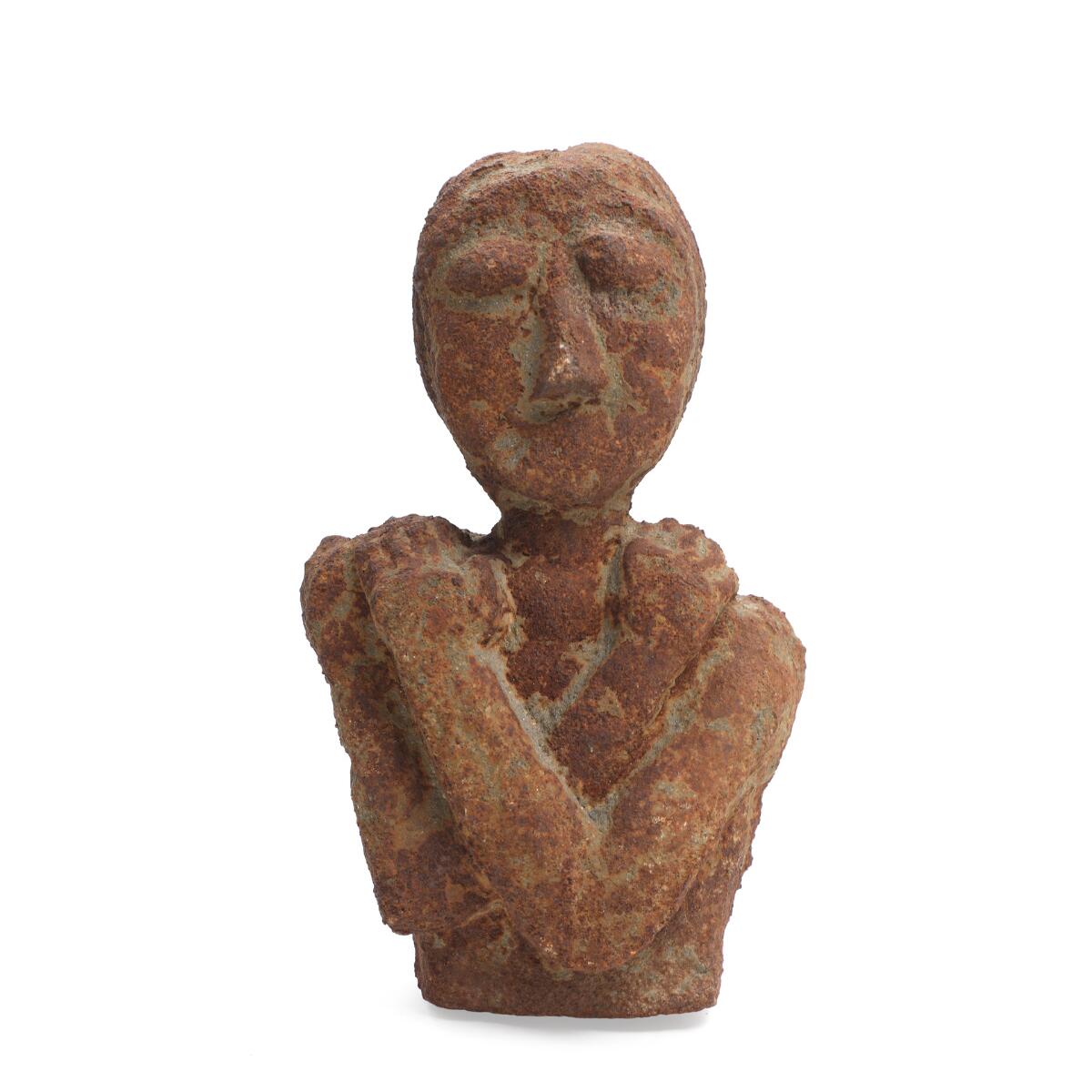 Erik Heide: Woman figure. Unsigned. Patinated cast iron. H. 40. W. 23 cm.