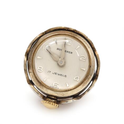 Bucherer: A pendant watch of part gilt sterling silver embellished with translucent red enamel on a guilloche ground. Ø 22 mm.