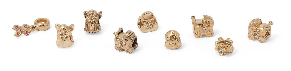 Pandora: A collection comprising of nine loose charms, mounted i