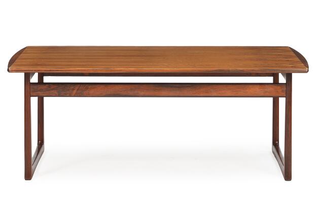 A rosewood coffee table on runner legs. Manufactured and marked by Nesjestranda Møbelfabrikk for Bruksbo, Norway. 1960s. H. 53. L. 140. W. 78 cm.