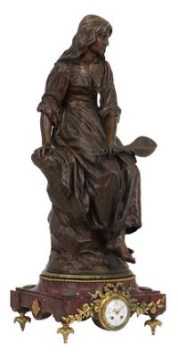 Paul-Eugène Mengin (b. Paris 1853, d. 1937), A large Napoleon III mantel clock with a female figural bronze statue of patinated bronze, Soprano Mandolin Player, mounted on a revolving rouge marble base mounted with clock, white enamel dial decorated with flowers. The figure is signed in the casting 'P.MENGIN, Susse. F. Paris. E.st'. Second half of the 19th century. H. 90 cm. W. 34 cm. D. 30 cm.