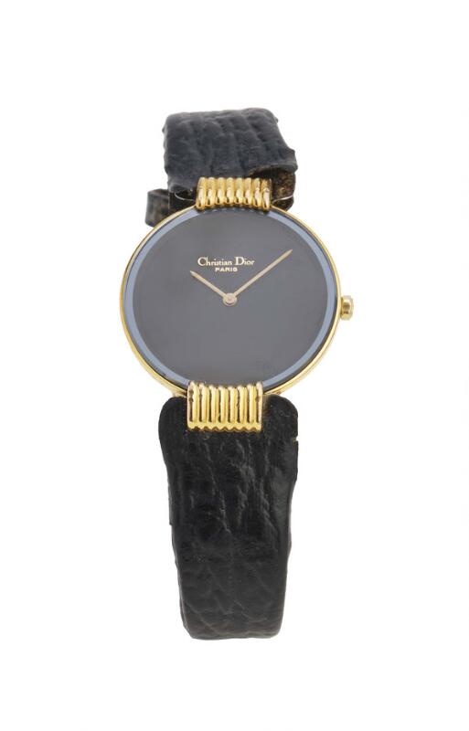Christian Dior: Gilt steel, ref. 46-153. Quartz movement. 2000s