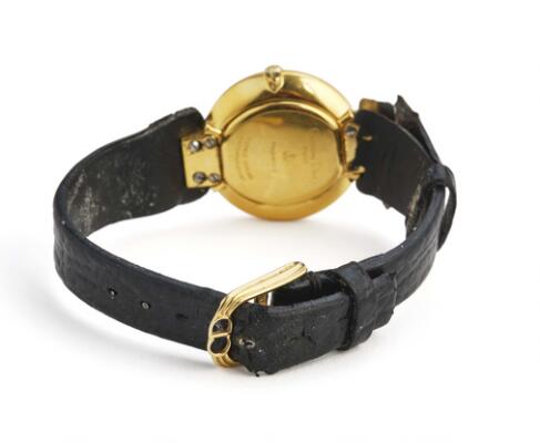 Christian Dior: Gilt steel, ref. 46-153. Quartz movement. 2000s