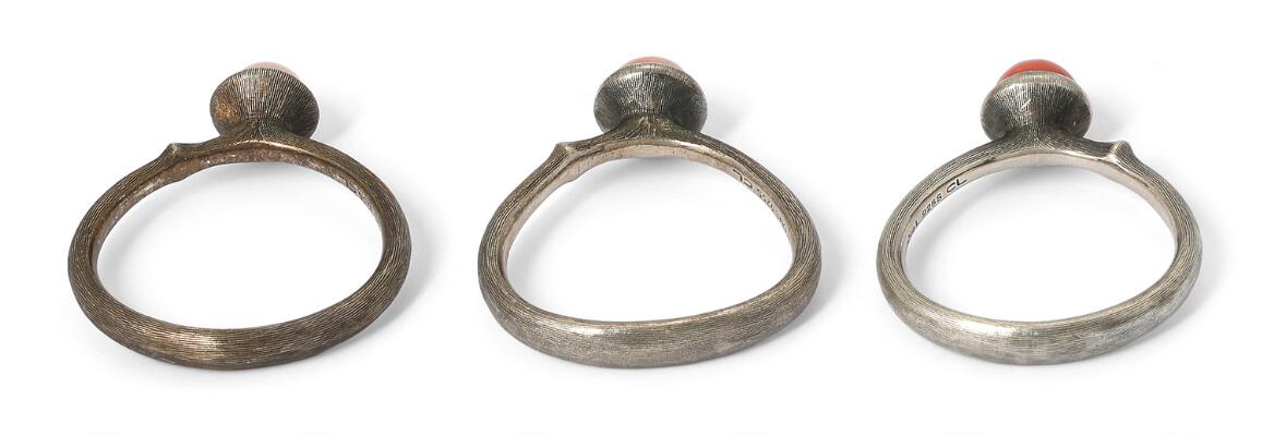 SOLD. Charlotte Lynggaard: Thre Lotus rings each set with