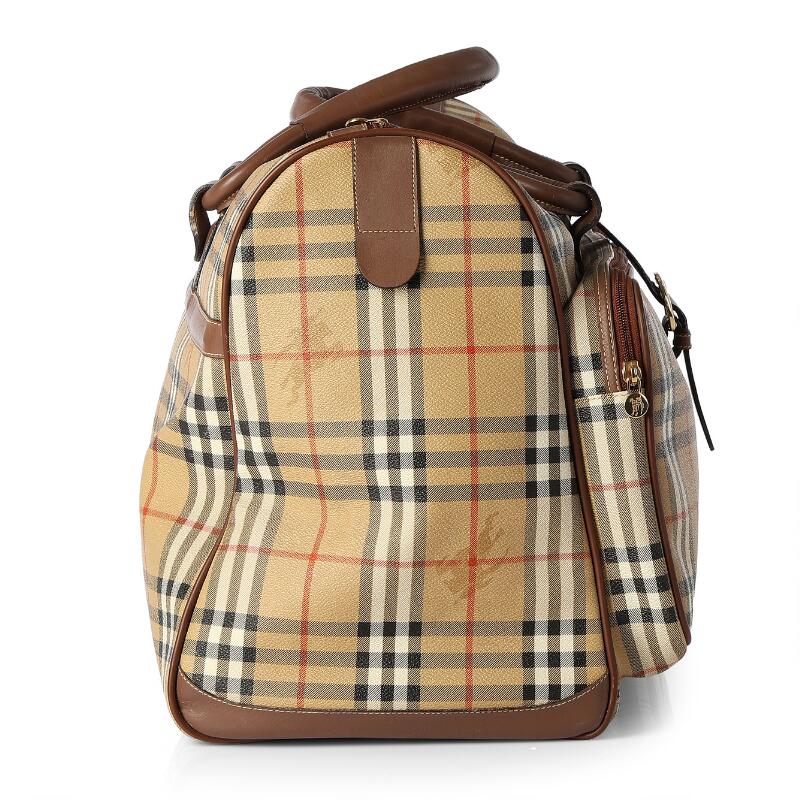 Burberry: A “Vintage Large Boston” travel bag made of brown