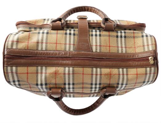 Burberry: A “Vintage Large Boston” travel bag made of brown