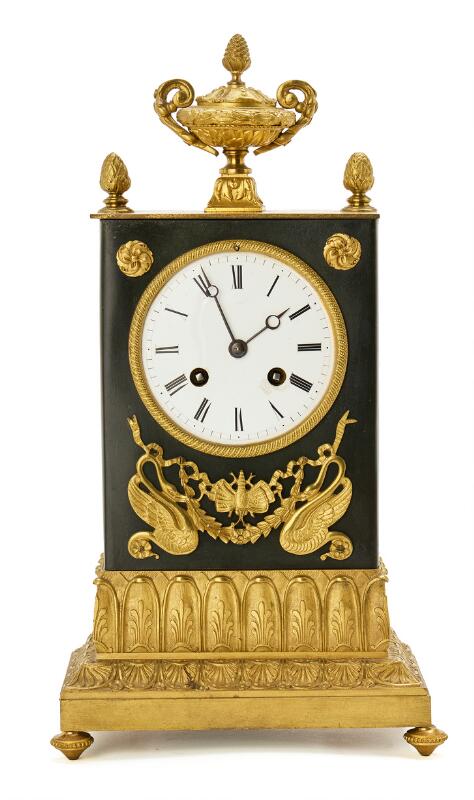 A French Charles X mantel clock in gilded and patinated bronze