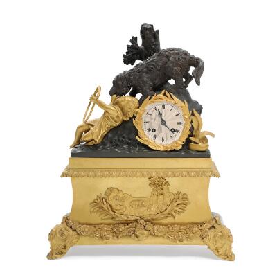 French mantel clock of gilded and patinated bronze, decorated with