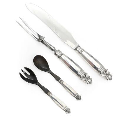 “Acorn” carving set and “Acanthus” salad set with silver and sterling silver handles. Georg Jensen 1925 and after 1945. L. 16.2–32 cm. (4)