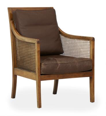 Mahogany bergere. Sides and back with with woven cane. Cushions in seat and back upholstered with brown leather.