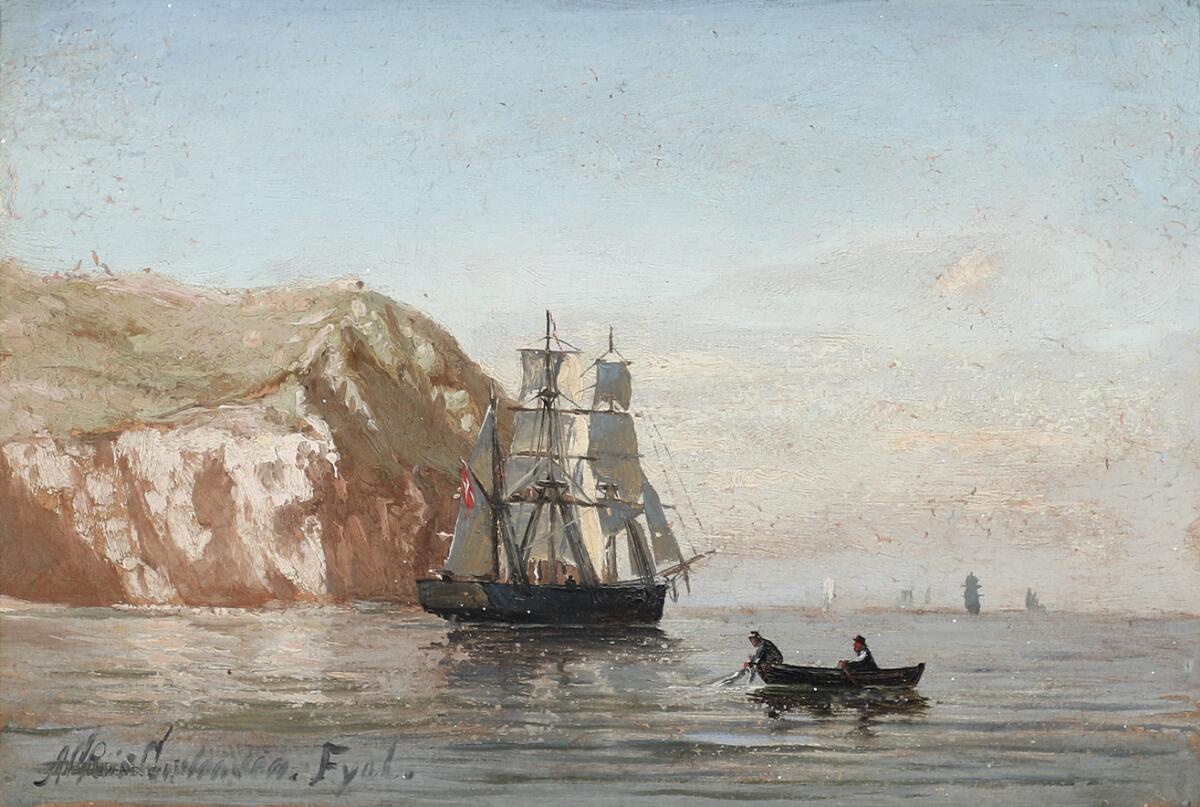A. Riis Carstensen: Sailing ship and rowing boat off a rocky coastline. Signed. Oil on paper. 17 × 24 cm. — Paintings — Bruun Rasmussen