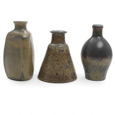 Three stoneware vases, decorated with grey/brown glaze. Manufactured and marked by L. Hjorth. H. 12.5–15 cm. (3)