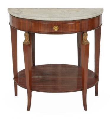 A French Empire console of mahogany with semicircular top of white marble, front legs with female busts of gilded bronze, back plate with later mirror glass. Stamped 'G: JACOB'. Early 19th century. H. 89 cm. W. 92 cm. D. 47 cm.