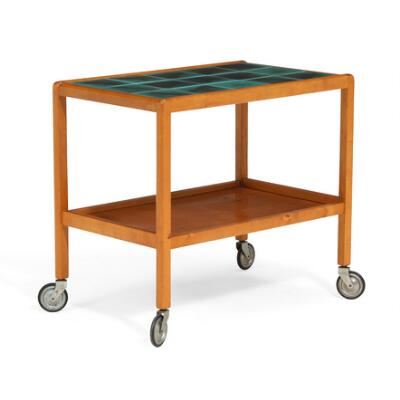 Birch serving trolley. Top with green tiles from Uppsala-Ekeby. Manufactured 1930–1940s. H. 61 cm. L. 68 cm. W. 43 cm.